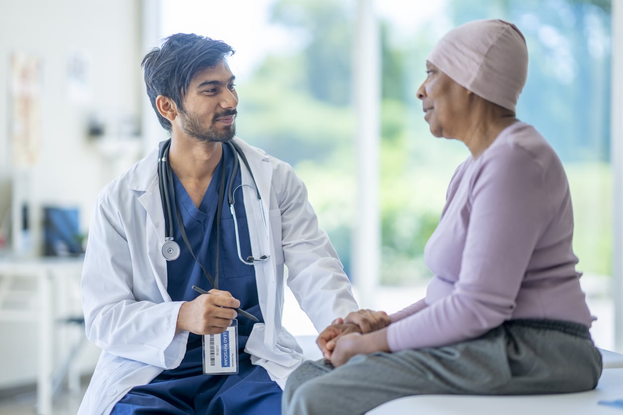 Oncologist Discussing Medications with a Senior Patient