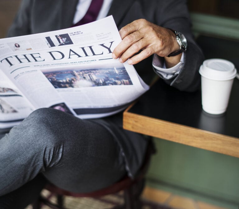 businessman-reading-daily-news (1)